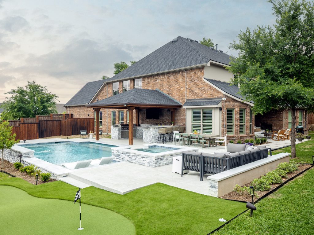 outdoor pool and gray patio furniture